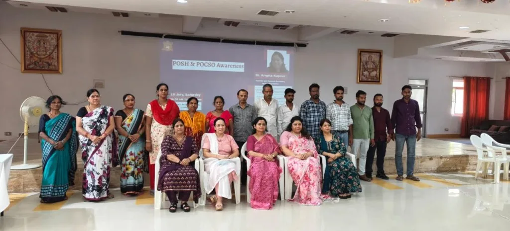 Internal Committee members and staff attending POSH Act training in Lucknow
