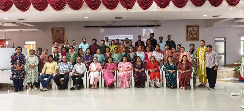 POSH trainer explaining complaint procedures to employees during a workplace training session in Lucknow